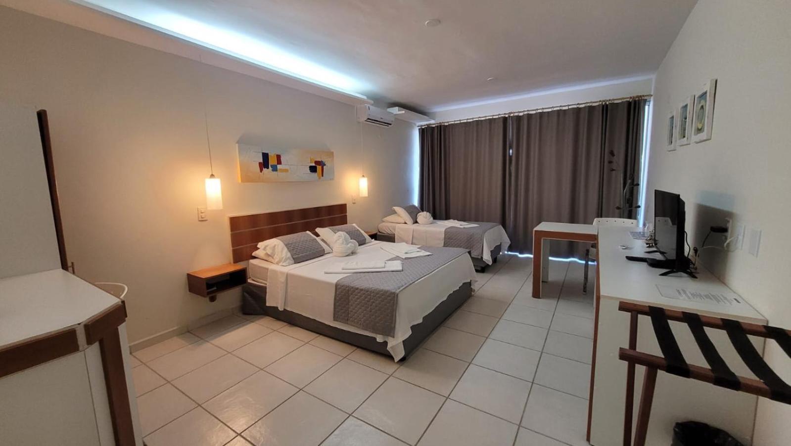 Quarto Família com Vista do Mar